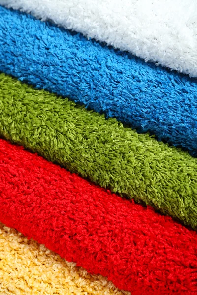 Багато килимів різних кольорів крупним планом — стокове фото