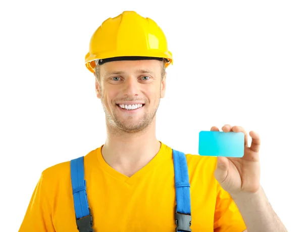 Portrait of young builder with card isolated on white — Stock Photo, Image