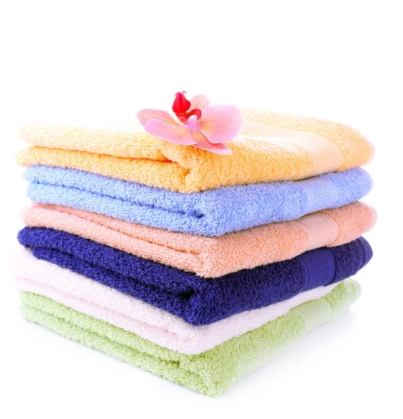 Orchid flower and towels, isolated on white — Stock Photo, Image