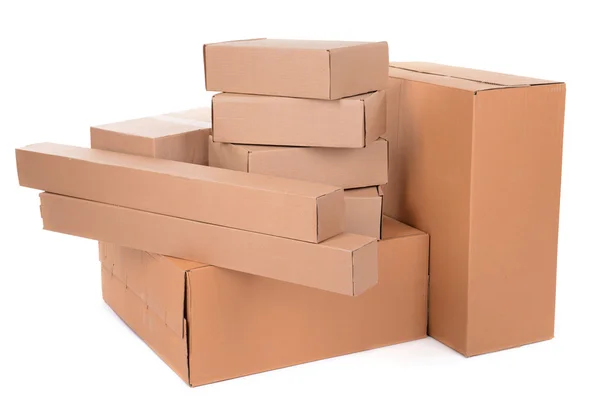 Different cardboard boxes isolated on white — Stock Photo, Image