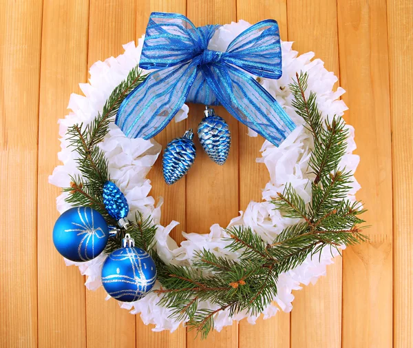 Christmas wreath on wooden background — Stock Photo, Image