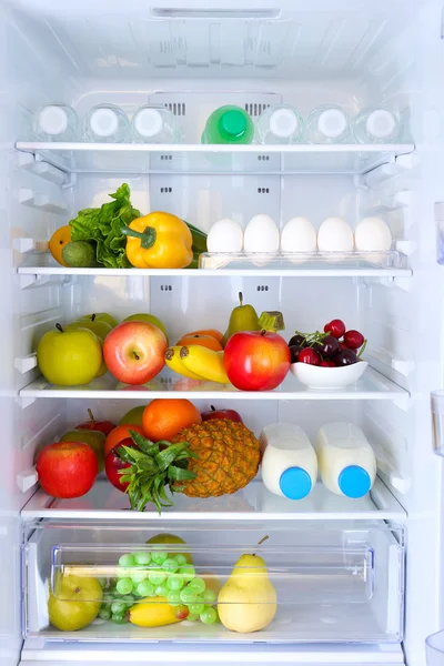 Refrigerator full of food Stock Photo
