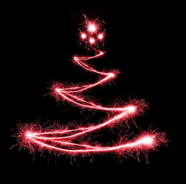 Christmas tree-shaped sparklers on black background — Stock Photo, Image