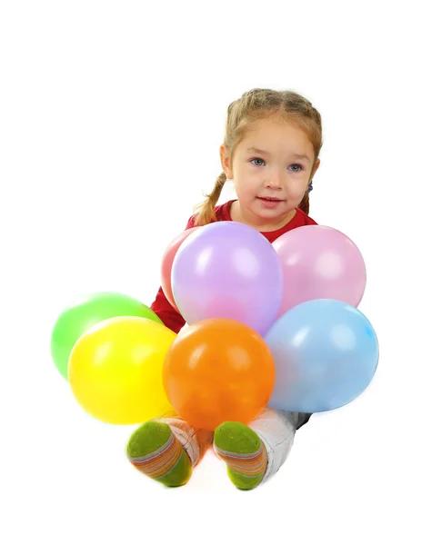 Little girl with colorful balloons isolated on white — Stock Photo, Image