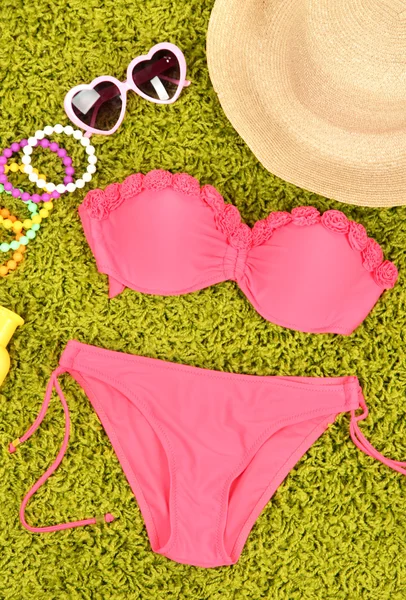 Swimsuit and beach items — Stock Photo, Image