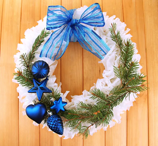 Christmas wreath on wooden background — Stock Photo, Image