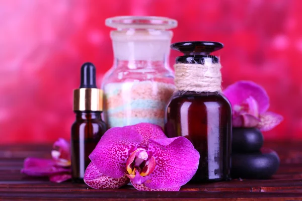 Spa setting with orchid on bamboo table — Stock Photo, Image