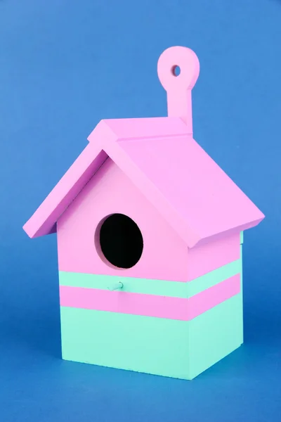 Decorative nesting box on color background — Stock Photo, Image