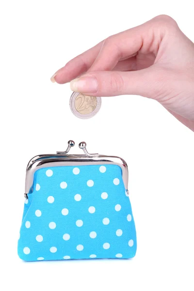 Handväska och mynt i kvinnlig hand — Stockfoto