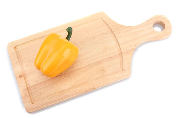 Papriky na dřevěné prkénko — Stock fotografie