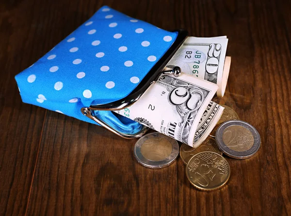 Blauwe tas met geld — Stockfoto