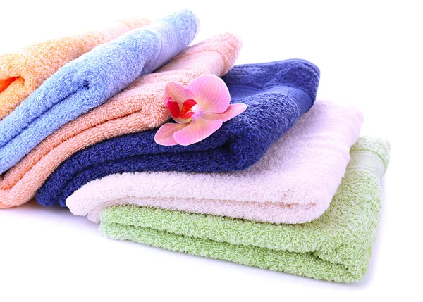 Orchid flower and towels, isolated on white — Stock Photo, Image