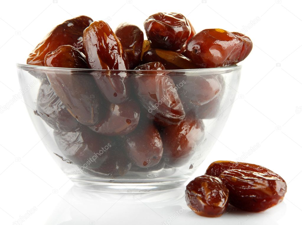 Dried dates in glass bowl