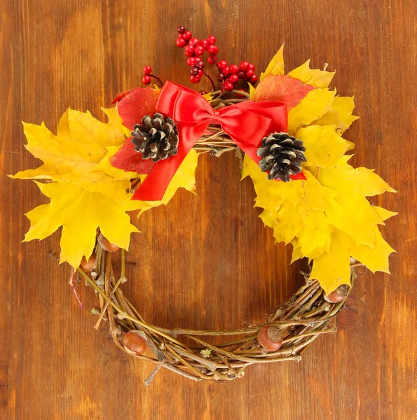 Beautiful Thanksgiving wreath, on wooden background — Stock Photo, Image