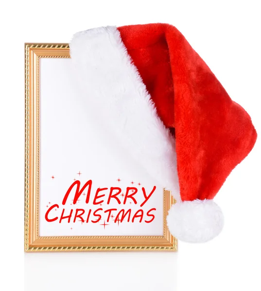 Christmas hat hung on old frame isolated on white — Stock Photo, Image