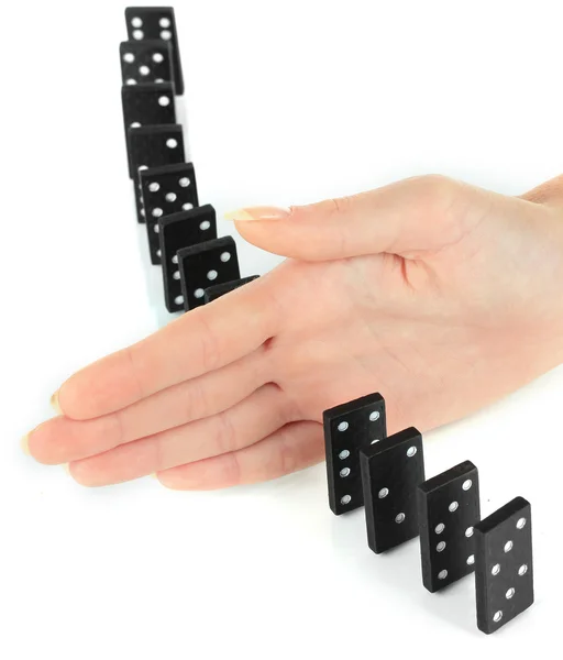 Hand stopping dominoes falling isolated on white — Stock Photo, Image