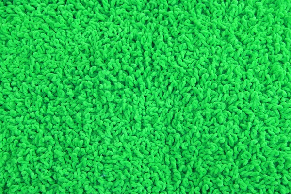 毛茸茸的绿色枕头特写背景 — 图库照片