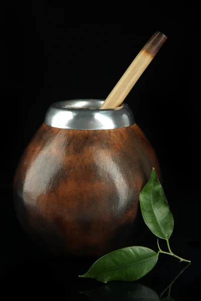 Calabash and bombilla with yerba mate isolated on black — Stock Photo, Image