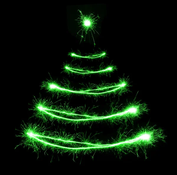 Christmas tree-shaped sparklers on black background — Stock Photo, Image