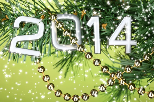 2014 hang on Christmas tree close-up on green background — Stock Photo, Image