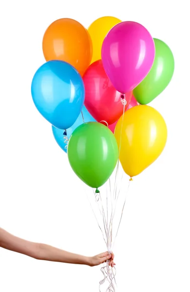 Mano sostiene globos de colores aislados en blanco — Foto de Stock