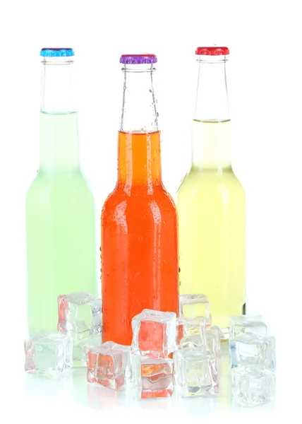 Drinks in glass bottles isolated on white — Stock Photo, Image