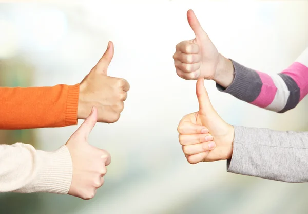 Human hands on bright background — Stock Photo, Image