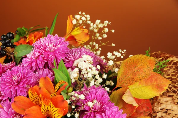 Flowers composition on brown background — Stock Photo, Image