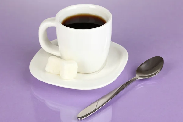 A cup of strong coffee on purple background — Stock Photo, Image