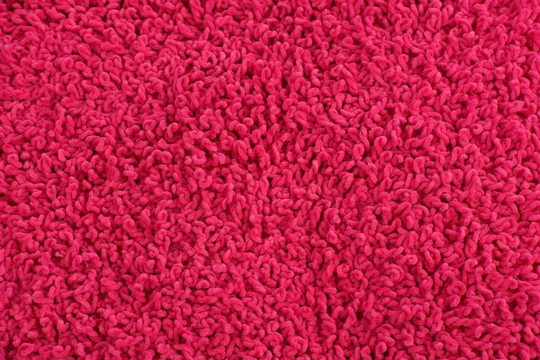 Fleecy pink pillow close-up background — Stock Photo, Image