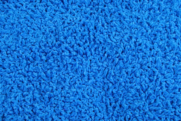 Fleecy blue pillow close-up background — Stock Photo, Image