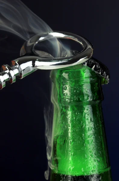 Top of open wet beer bottle on dark background — Stock Photo, Image