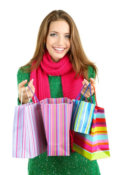 Красива усміхнена дівчина з подарунковими пакетами ізольована на білому — стокове фото