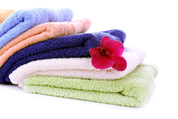 Orchid flower and towels, isolated on white — Stock Photo, Image