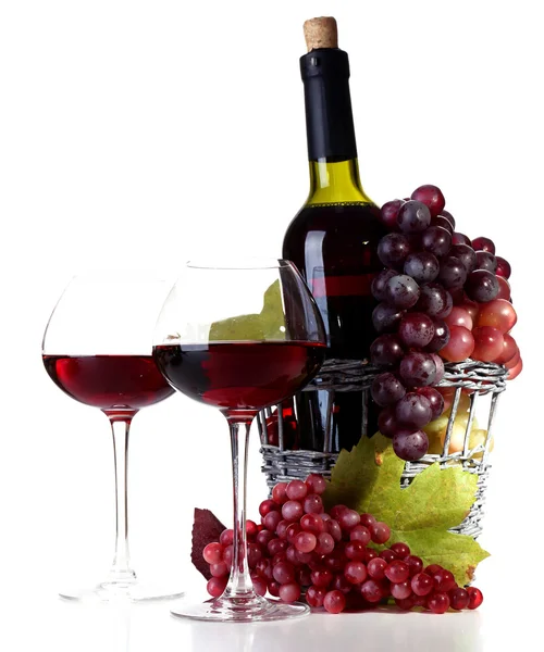 Wineglasses with red wine, grape and bottle isolated on white — Stock Photo, Image