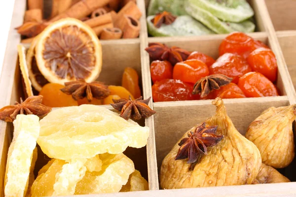 Dried fruits and cinnamon with anise stars in box close-up — Stock Photo, Image