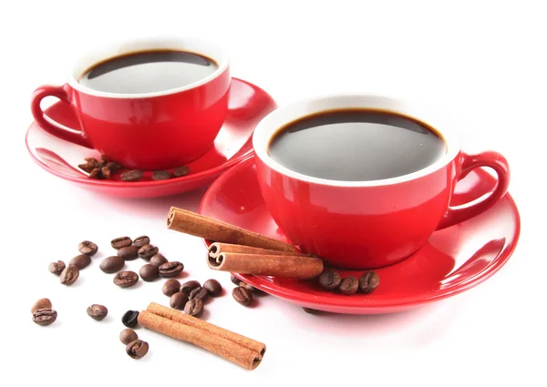 Red cups of strong coffee and coffee beans isolated on white — Stock Photo, Image