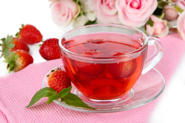 Delicious strawberry tea on table close-up — Stock Photo, Image