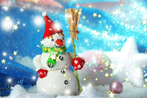 Beautiful snowman and Christmas decor, on bright background — Stock Photo, Image