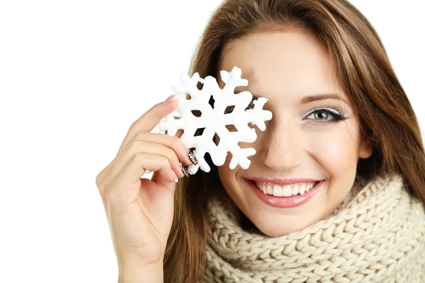 Beautiful smiling girl with Christmas snowflake isolated on white — Stock Photo, Image