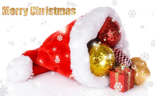 Christmas hat with Christmas decorations isolated on white — Stock Photo, Image
