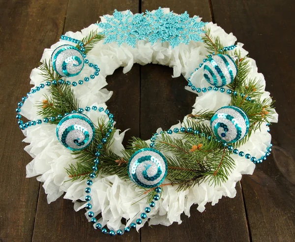 Christmas wreath on wooden background — Stock Photo, Image