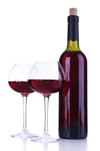 Wineglasses with red wine, grape and bottle isolated on white — Stock Photo, Image