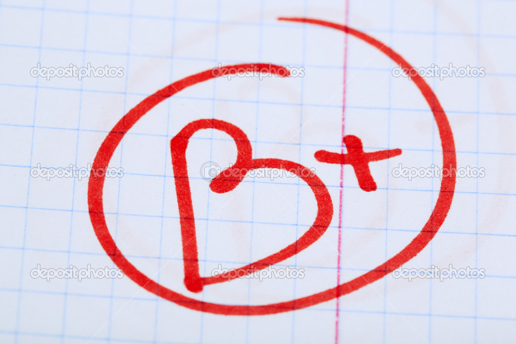 Grade B written on an exam paper Stock Photo by ©belchonock 36130171