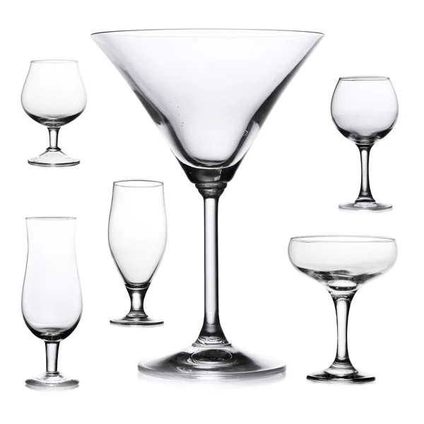 Collage of empty glasses isolated on white — Stock Photo, Image