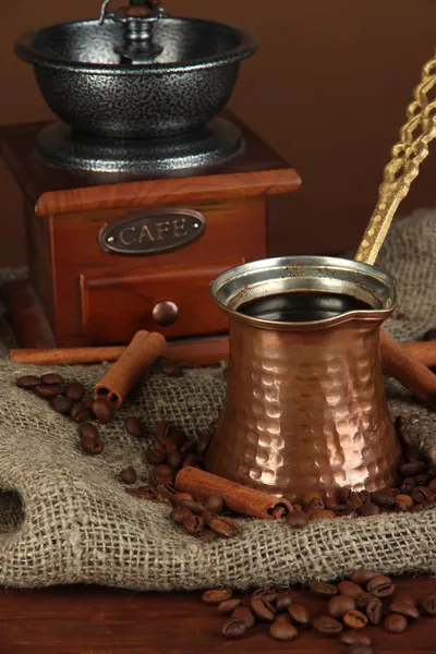 Metal turk and coffee beans on dark background — Stock Photo, Image