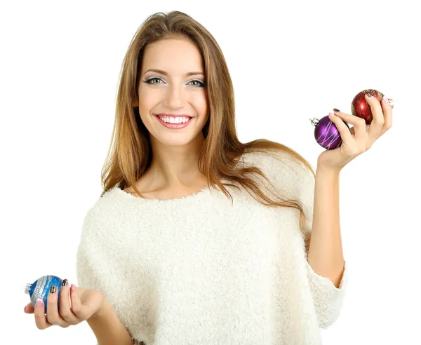 Beautiful smiling girl with Christmas toys isolated on white — Stock Photo, Image
