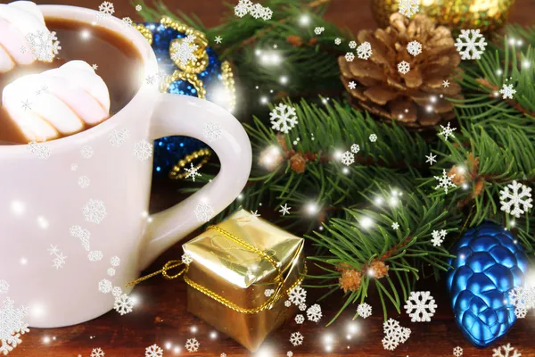 Cup of hot cacao with Christmas decorations close up — Stock Photo, Image