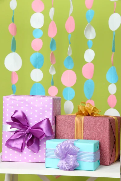 Beautiful presents on table on bright background — Stock Photo, Image
