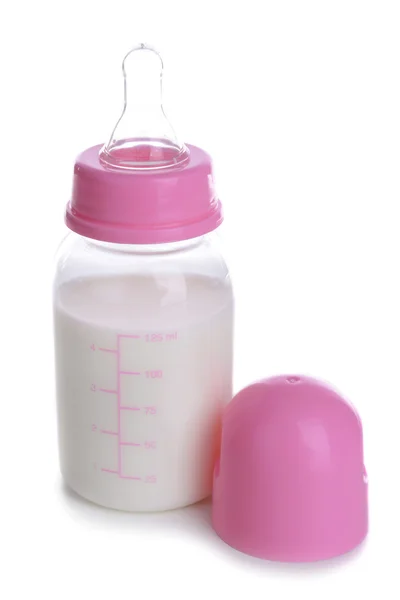 Baby bottle with milk and towel isolated on white — Stock Photo, Image